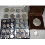 A collection in excess of 100 white metal Asian coins and similar and a cased medallion, Republic