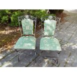 A pair of contemporary wrought iron kitchen chairs, with upholstered back and seats (2)