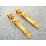 A pair of carved wood corbells depicting Lions, 123cm x 25cm x 22cm