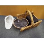 A mixed lot to include two wicker baskets, a ceramics slipper and other (qty)