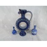 A small collection of blue and white oriental ware to include two small narrow necked bottles and a