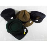 Four hats to include a Scout Masters hat, Royal Navy hat, an American Cavalry hat and one other (4)