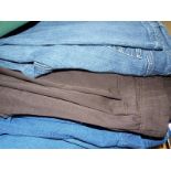 Lady's Fashion - A large quantity of clothing to include jeans, leggings, horse riding trousers and