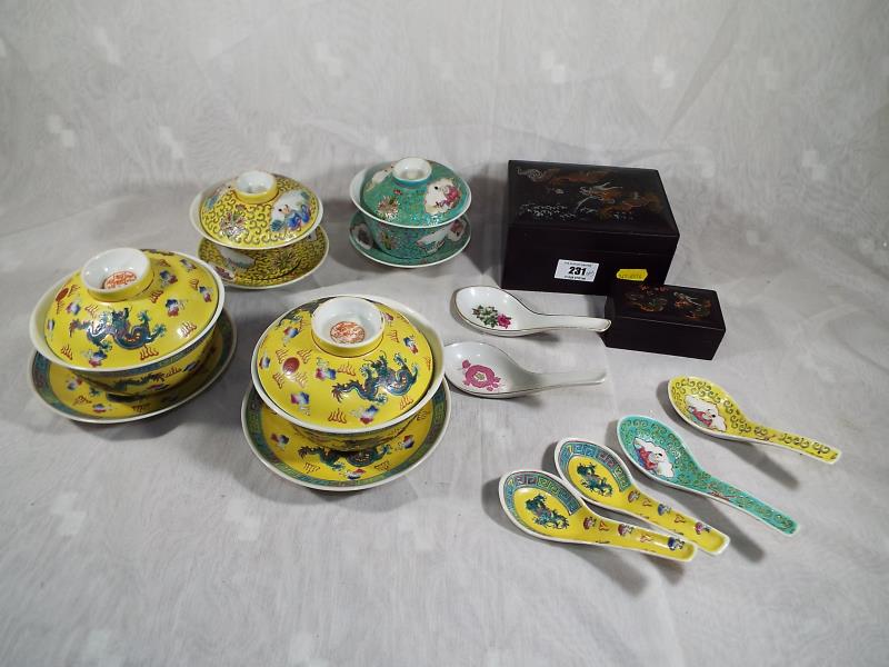 A collection of Chinese ceramic soup bowls, two Chinese hand painted trinket boxes with relief