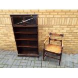 A 19th century oak hall chair and a bookcase, 138cm (h) x 76cm (w) x 23.5cm (d) - (2)