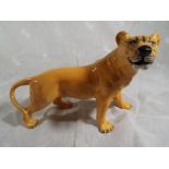 A Beswick pottery figurine depicting a lioness facing left model 1507, 12.1 cm (h) - Estimate £30 -