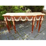 An ornate mahogany hall table on tapered supports decorated with swags and gilded acanhtus leaves