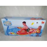 Unused Retail Stock - A Bestway Splash and Play Jet Ski with water gun, boxed