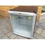 A small glass fronted refrigerator marked Delta, 50cm x 44cm x 50cm