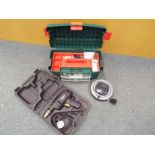 A heavy duty plastic moulded tool box with a small quantity of tools, a Black and Decker BD142 500