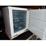 An integrated AEG refrigerator, 84cm x 60cm x 55cm