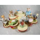 Eight Royal Albert / Beswick Beatrix Potter figurines comprising Timmy Tiptoes, Peter in the
