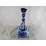 A large Moorcroft / MacIntyre bulbous vase with flared neck, blue florian ware, signed to the base,