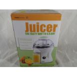 A Lloyds Pharmacy juicer with instructions, unused with original box