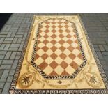 A wool rug with chequerboard centre and Greek key border, 252 cm x 161 cm