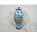 A Wiltshire and Robinson Carlton Ware lidded pagoda vase, lustre finish with gilt oriental