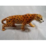 A Beswick pottery figurine depicting a leopard - 1082, 12.1 cm (h) - Estimate £30 - £50