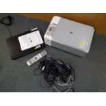 A HP photo smart C3180 printer, scanner, copier, a digital personal DVD recorder by Humax PVR/9150T