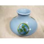 Moorcroft Pottery - A modern roundells squat vase, pale blue ground, 7.5cm (h) - Est £40 - £60