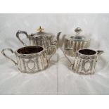 A Walker & Hall three piece silver plated tea set and a white metal lidded box with lined interior