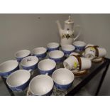A Royal Doulton teapot in the Larchmont pattern, Noritake cups and saucers and a collection of