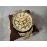 A lady's designer wristwatch by Michael Kors, Mother of Pearl finish dial,