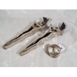 A pair of Eastern silver ornamental posies in the form of knives with bone handles (one handle a/f),