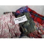 A box containing a quantity of vintage clothing