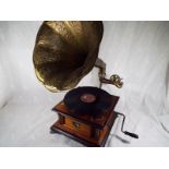 A reproduction horn gramophone with HMV logo working order