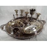 A collection of plated ware to include a large twin handled salver, sauce stand,