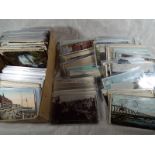 Approximately 400 early and period UK topographical postcards to include real photographs street