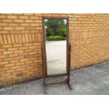 A wooden mirror stand,