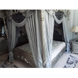 A substantial Four poster bed with ornate silvered decoration throughout -  to include all soft