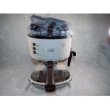 Ex Display - A Delongi Espresso coffee machine, cream and brown,