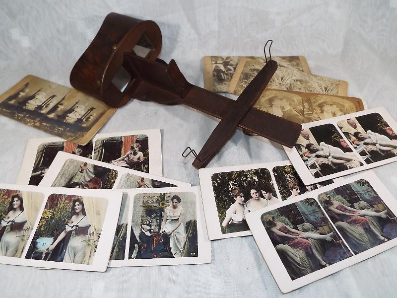 An early 20th century spectroscope with a selection of stereo slides