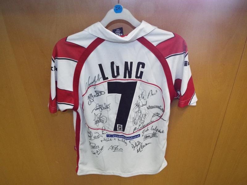 A child's Saint Helens Saints rugby league signed shirt,