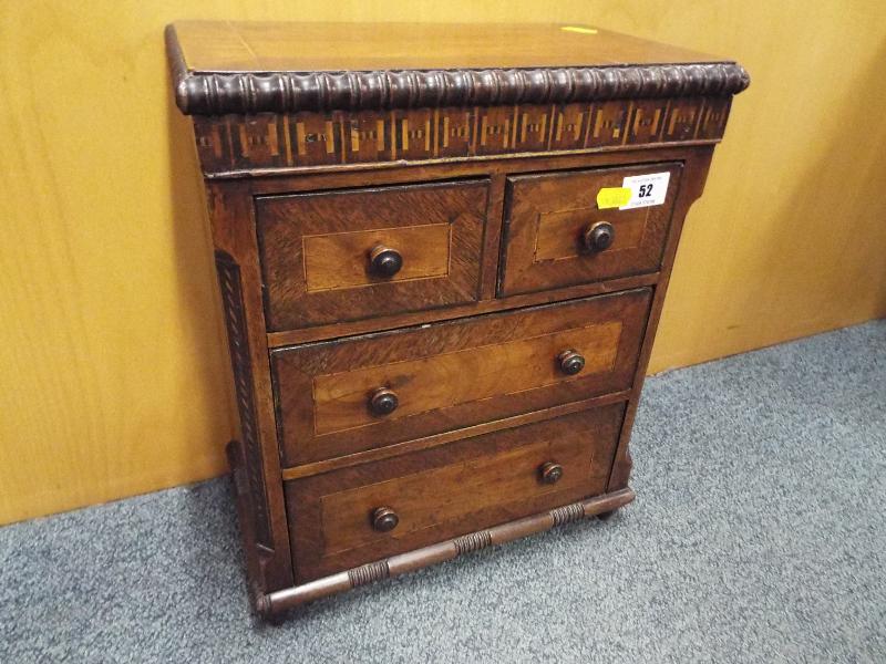 A mahogany miniature chest of two over two drawers, 39cm x 31cm x 17.