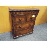 A mahogany miniature chest of two over two drawers, 39cm x 31cm x 17.