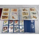 An album of Grandee cigarette cards to include Top Dogs, Wildlife and similar,