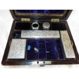 A mahogany cased vanity set with wooden partitions and glass trinket dishes with plated lid - Est