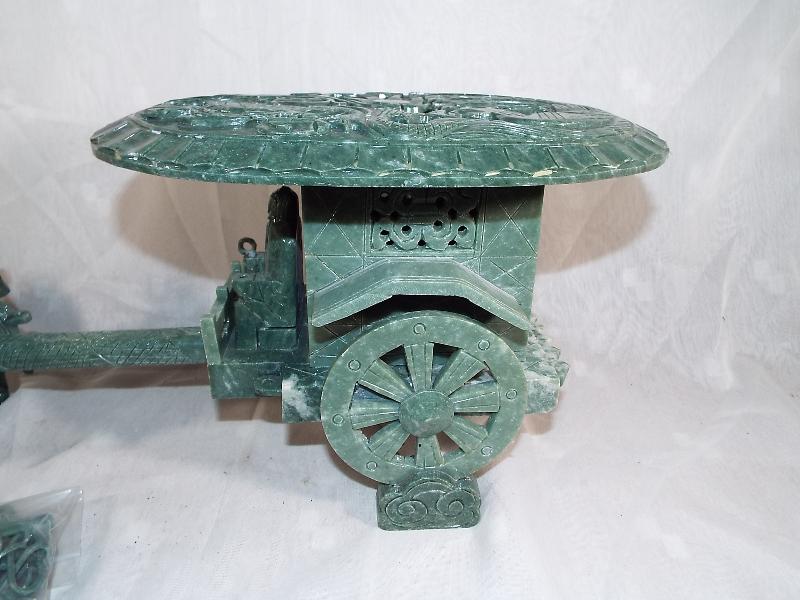 An oriental carved jadeite horse drawn carriage with relief decoration to the roof depicting a - Image 2 of 5