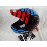 An Ixs cycling helmet,