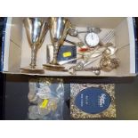 A mixed lot of silver plated ware to include flatware, photograph frame, mechanical sugar tongs,