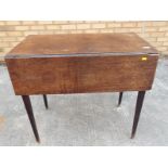 An oak drop leaf table 71cm (h) x 81cm (w) x 49cm (d) opening to 96cm