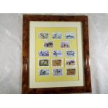 A framed collection of UK mint five pound postage stamps with a face value of £80