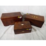 A collection of three wooden boxes