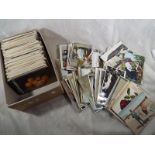 Approximately 600 UK topographical and subject postcards to include photographs, animated scenes,