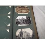 An album containing approximately 150 early 20th century topographical postcards to include some