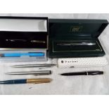 Five Parker pens and a Cross pen to include a fountain pen with 14k gold nib