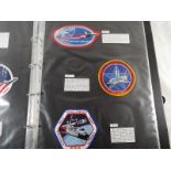 NASA Space Patches - an album containing a collection of Space cloth patches supplied by the
